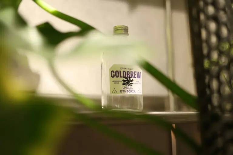 Cold brew coffee in a glass bottle.